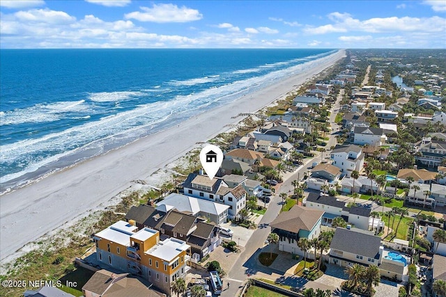 bird's eye view with a water view, a residential view, and a view of the beach