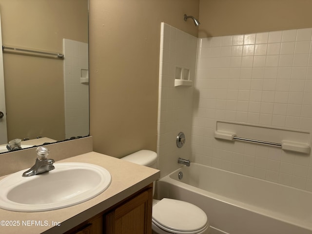 full bathroom featuring toilet, vanity, and shower / bathtub combination