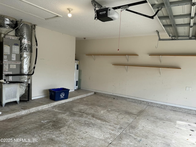 garage featuring water heater, baseboards, and a garage door opener