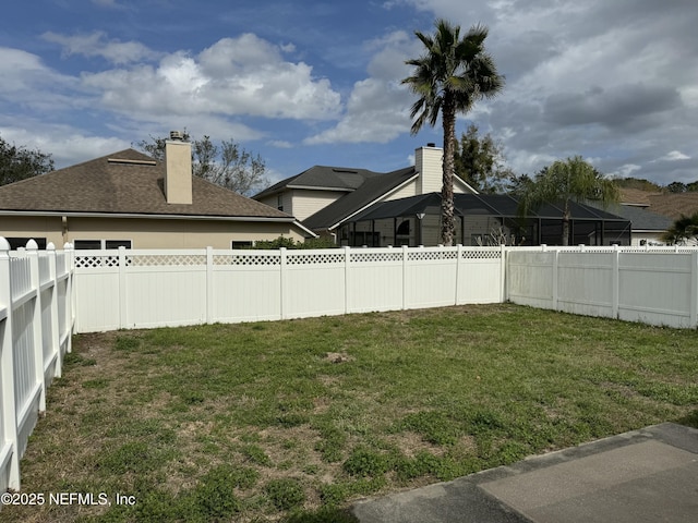 view of yard featuring a fenced backyard