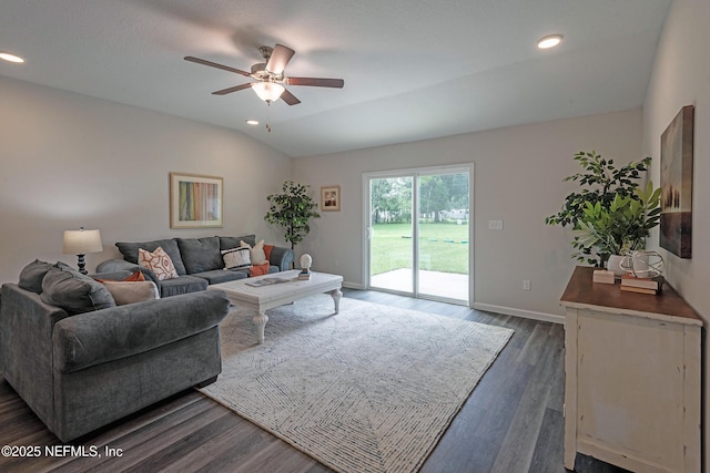 living area with baseboards, dark wood finished floors, ceiling fan, vaulted ceiling, and recessed lighting