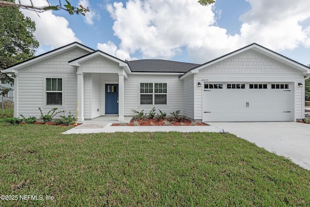 ranch-style house with an attached garage, concrete driveway, and a front yard