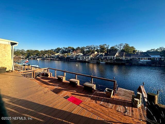 view of dock with a water view