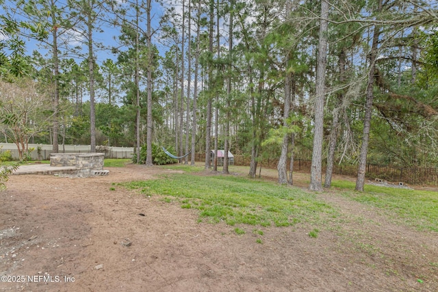 view of yard with fence