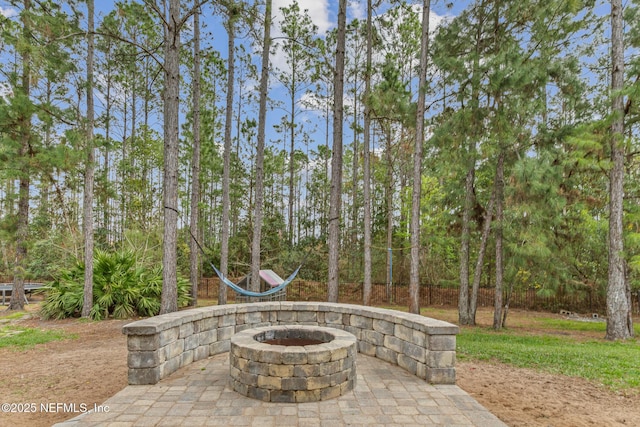 view of patio featuring a fire pit