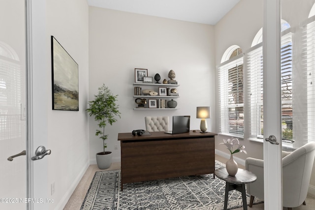 office area featuring french doors and baseboards