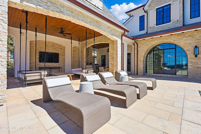 view of patio / terrace featuring outdoor lounge area and ceiling fan