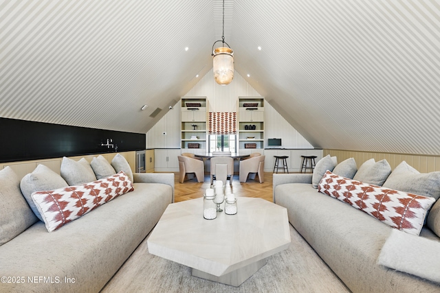 living area with lofted ceiling