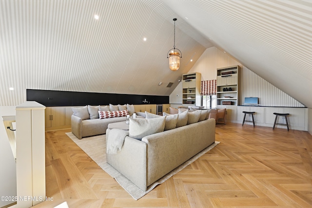 living area featuring lofted ceiling