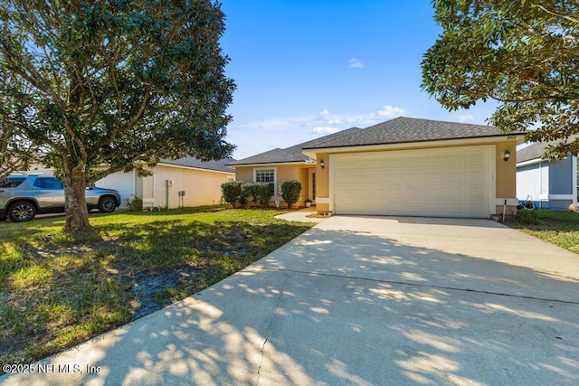 single story home featuring a garage, a front yard, concrete driveway, and stucco siding