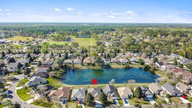 aerial view featuring a residential view and a water view