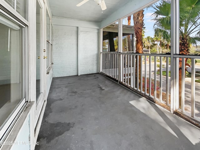 balcony featuring ceiling fan