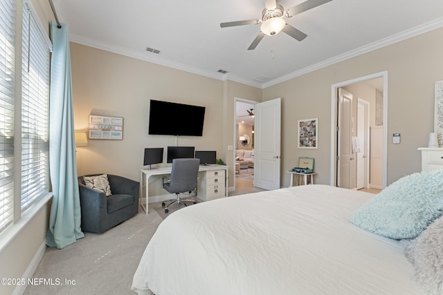 bedroom featuring visible vents, crown molding, ceiling fan, baseboards, and light carpet