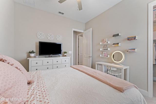 bedroom featuring visible vents, carpet flooring, a ceiling fan, and baseboards