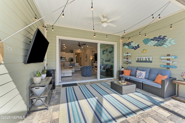 view of patio featuring outdoor lounge area and a ceiling fan