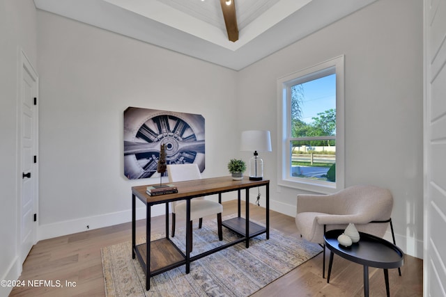 office space featuring light wood finished floors and baseboards