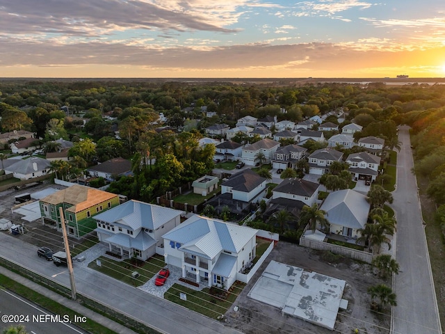 aerial view at dusk with a residential view