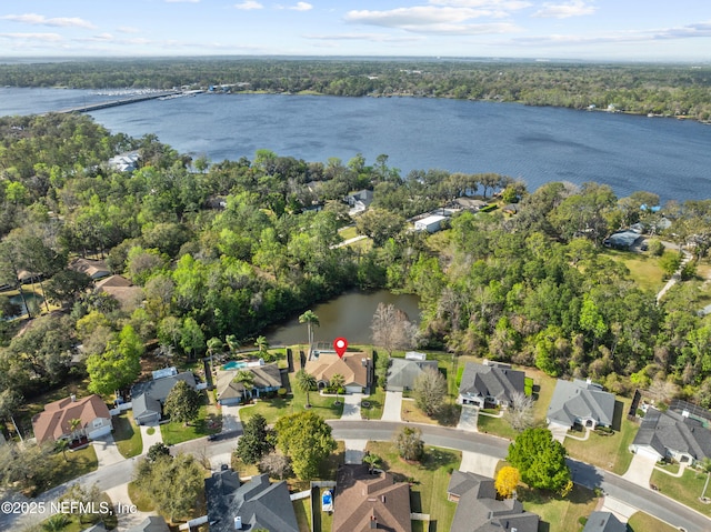 aerial view with a residential view and a water view