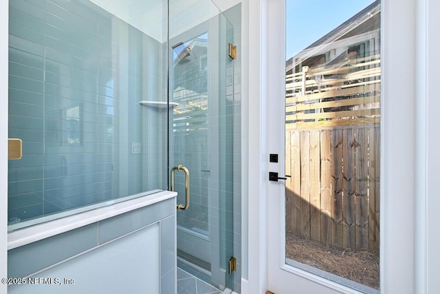 bathroom featuring a shower stall