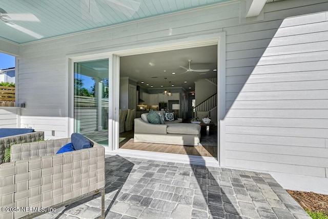 view of patio with ceiling fan