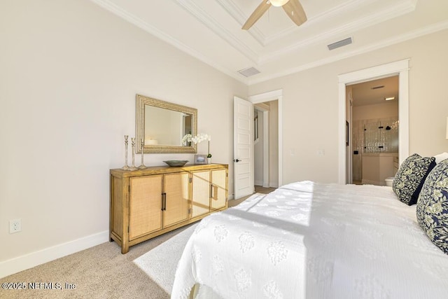 bedroom with baseboards, visible vents, a tray ceiling, light carpet, and crown molding