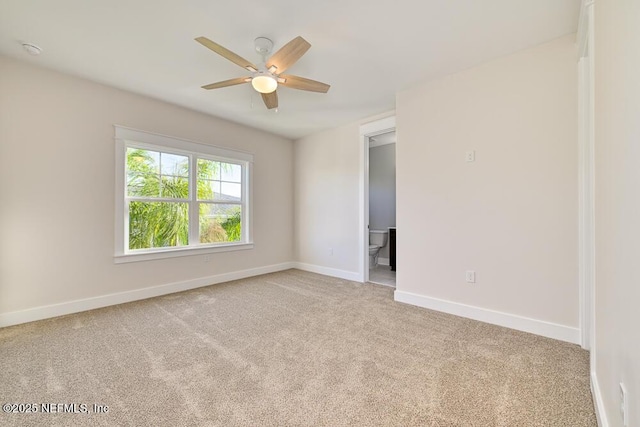 unfurnished room featuring ceiling fan, baseboards, and carpet floors