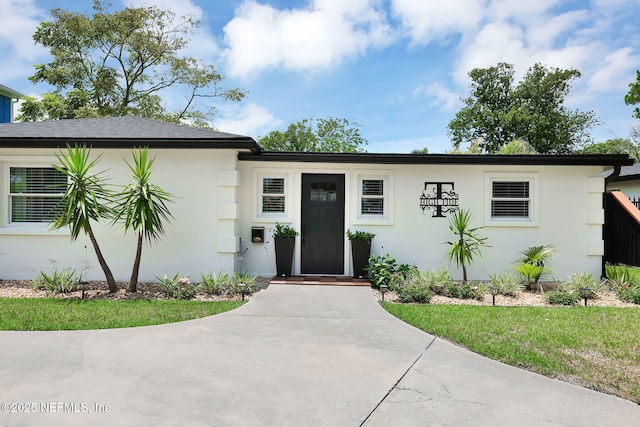 view of front of house with stucco siding