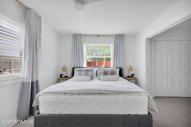 bedroom with wood finished floors