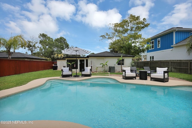 view of swimming pool featuring central air condition unit, an outdoor hangout area, a yard, a fenced backyard, and a patio area