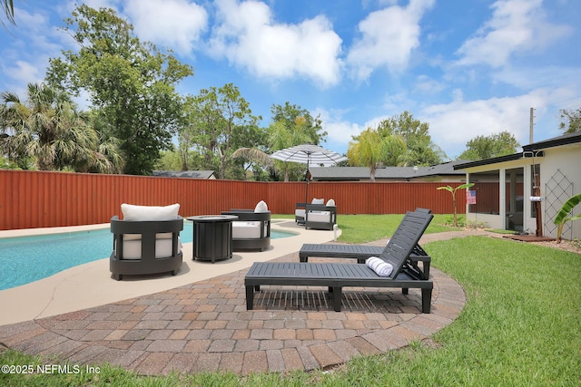 view of patio featuring a fenced in pool and a fenced backyard