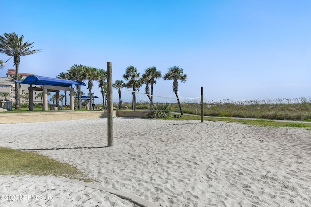 surrounding community featuring volleyball court