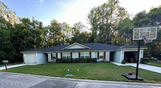 ranch-style house with a front yard, driveway, and an attached garage