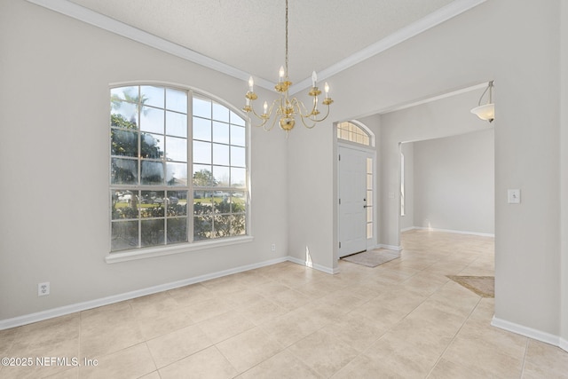 unfurnished room featuring a chandelier, a textured ceiling, light tile patterned flooring, baseboards, and ornamental molding