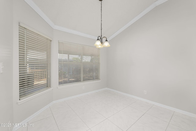 empty room featuring ornamental molding, a chandelier, vaulted ceiling, and light tile patterned floors