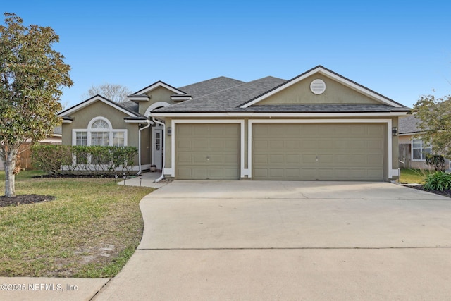 ranch-style house featuring an attached garage, driveway, a front lawn, and stucco siding