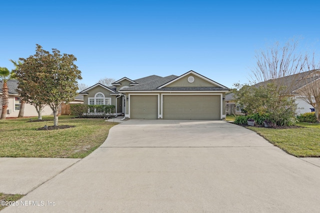 single story home with a garage, a front yard, driveway, and stucco siding