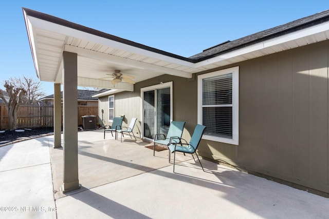 view of patio / terrace featuring fence and a ceiling fan