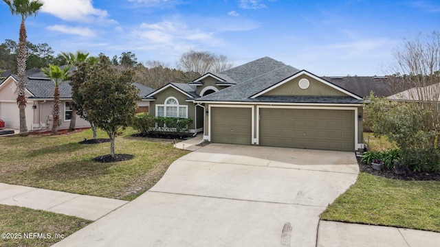 ranch-style house featuring a garage, concrete driveway, roof with shingles, a front yard, and stucco siding