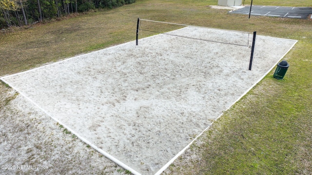 view of home's community featuring volleyball court