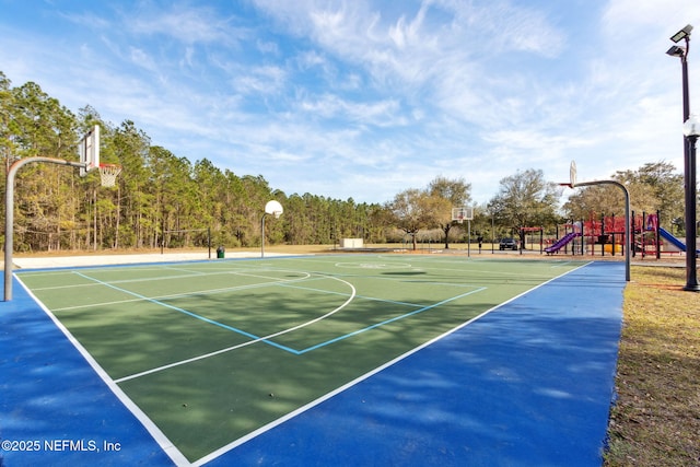 view of basketball court featuring community basketball court and playground community