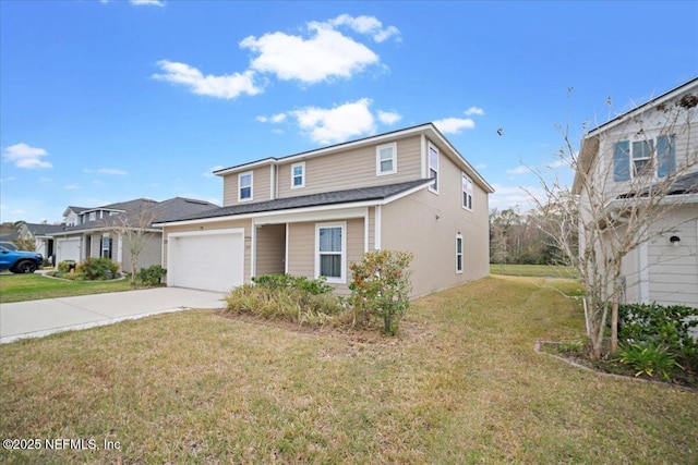 traditional-style house with a front lawn, concrete driveway, and stucco siding