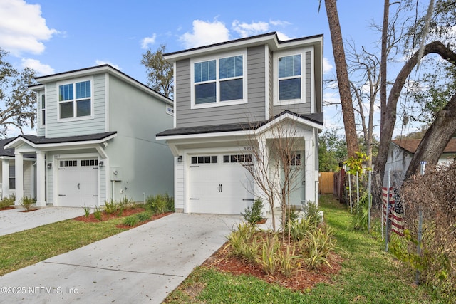 traditional home with a garage, concrete driveway, and fence