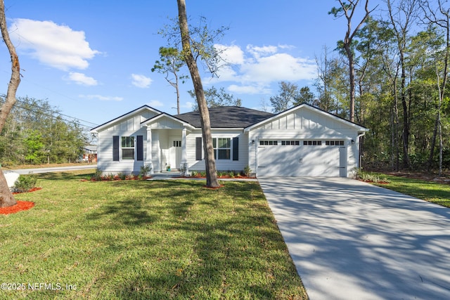 view of front of home featuring board and batten siding, concrete driveway, a garage, and a front lawn