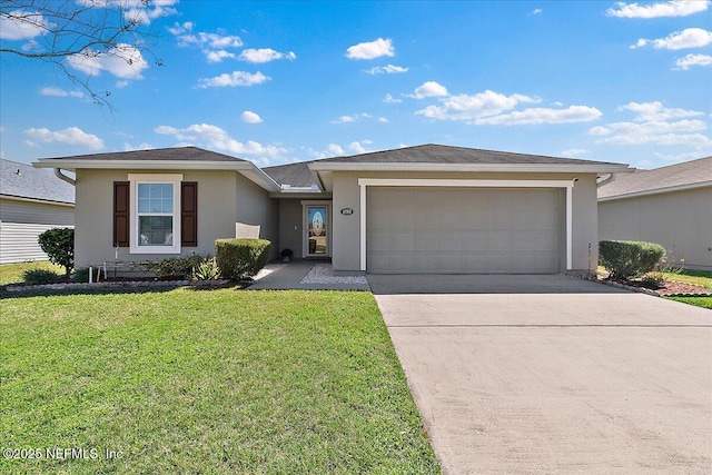 view of front of house with stucco siding, an attached garage, driveway, and a front lawn