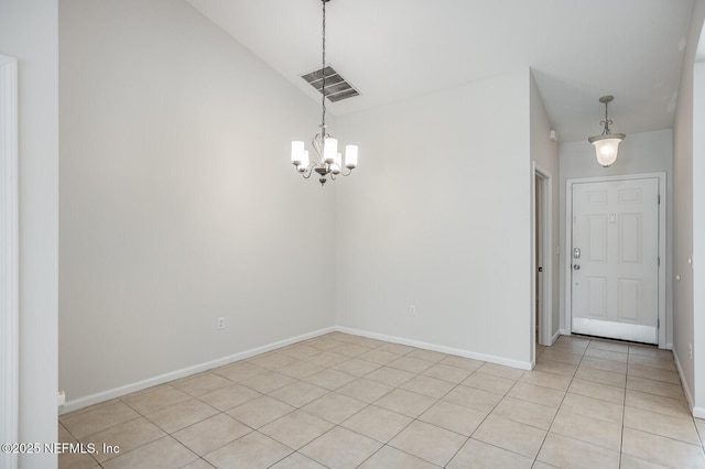 empty room with light tile patterned floors, visible vents, baseboards, vaulted ceiling, and an inviting chandelier