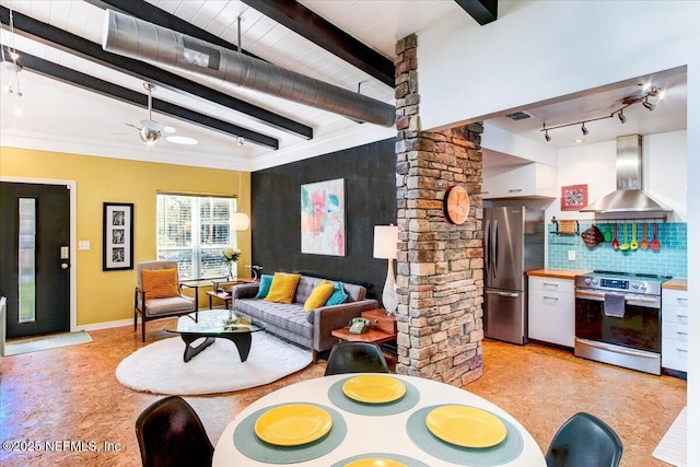 living area with visible vents, beamed ceiling, baseboards, and ceiling fan