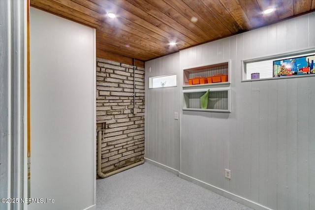 spare room with recessed lighting, wooden ceiling, carpet flooring, and plenty of natural light