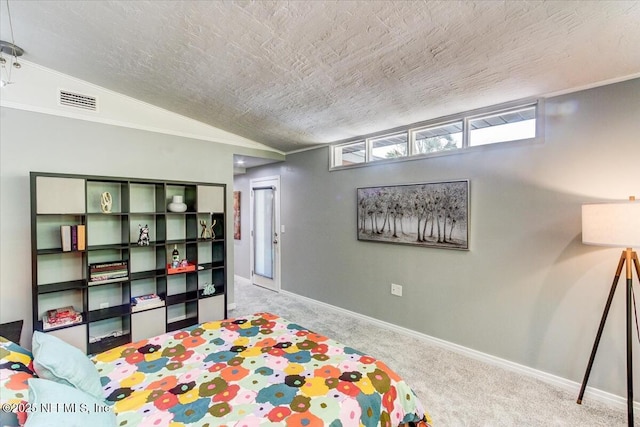 carpeted bedroom with lofted ceiling, visible vents, ornamental molding, a textured ceiling, and baseboards