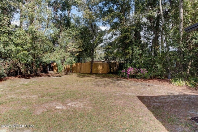 view of yard featuring fence