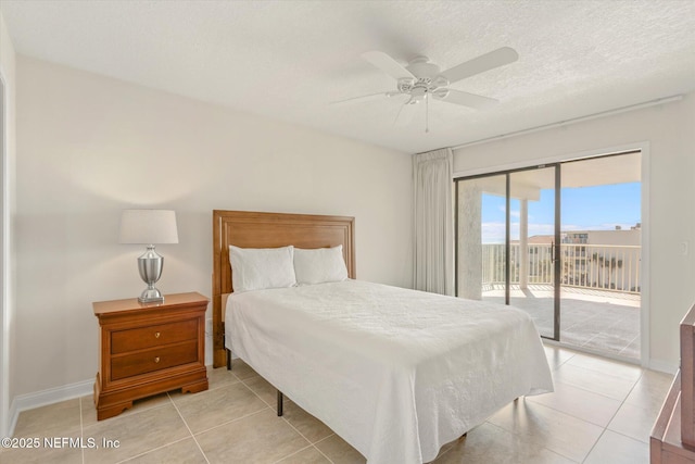 bedroom featuring access to outside, a textured ceiling, light tile patterned floors, baseboards, and ceiling fan